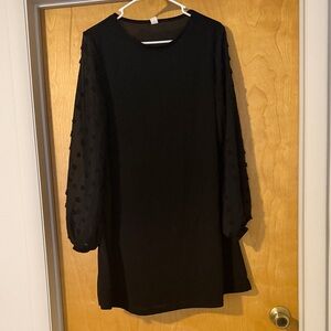 Chic Black Dress with Textured Sleeves